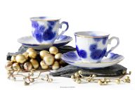 Kaffeetasse und Untertasse 2 tlg. handbemalt weiß/blau